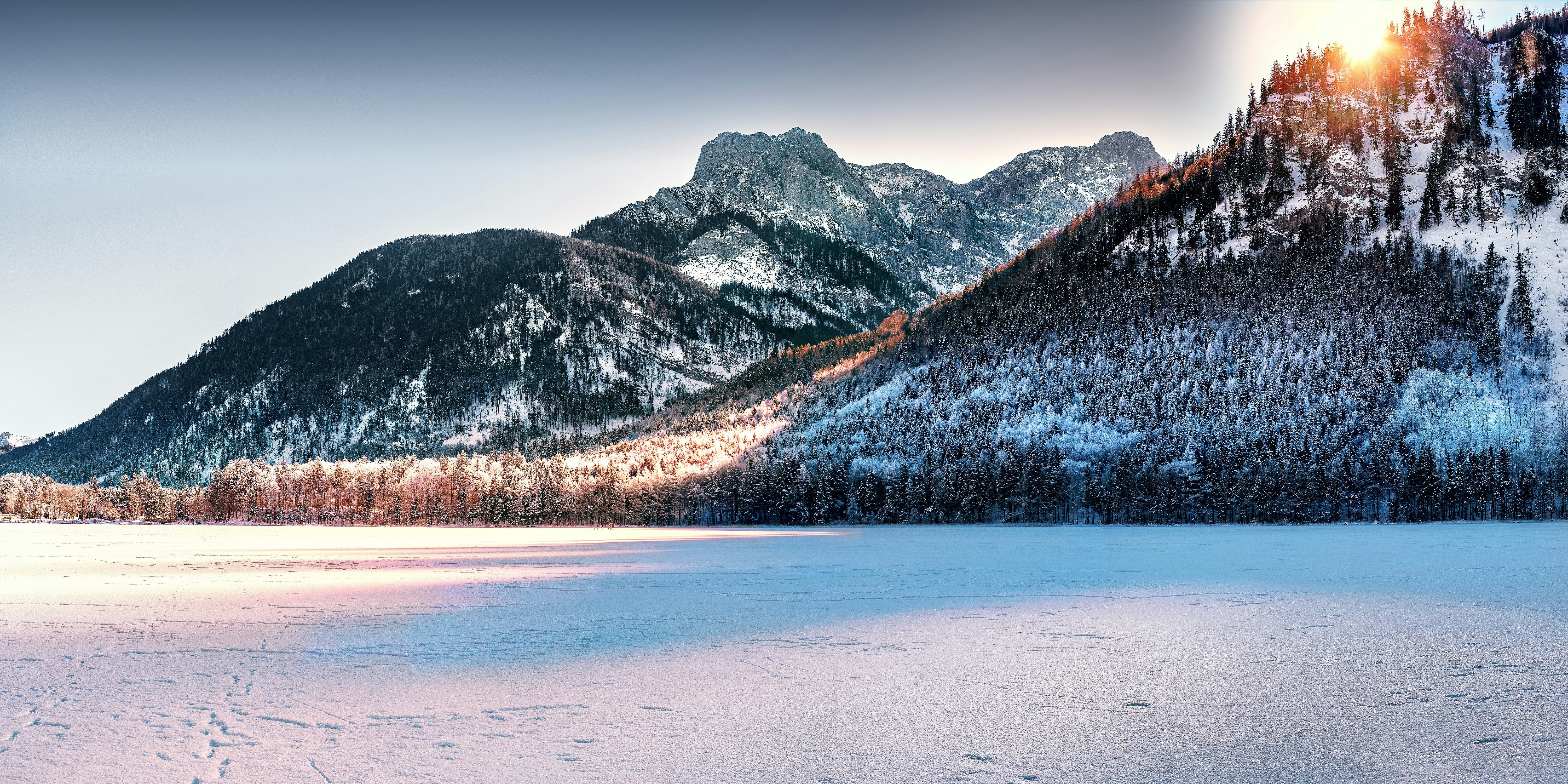 mountain range and snowy field photo